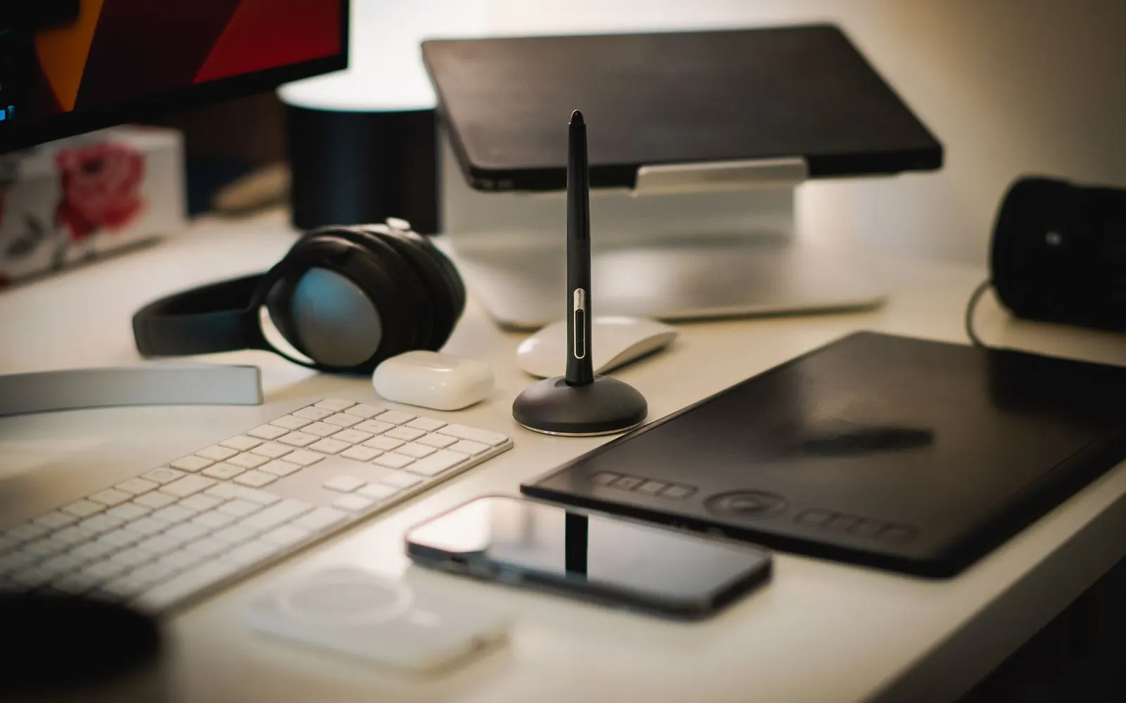 Designer desk with a drawing tablet and keyboard